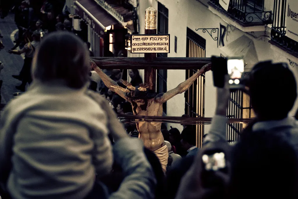 Historical procession scene in Málaga during Semana Santa