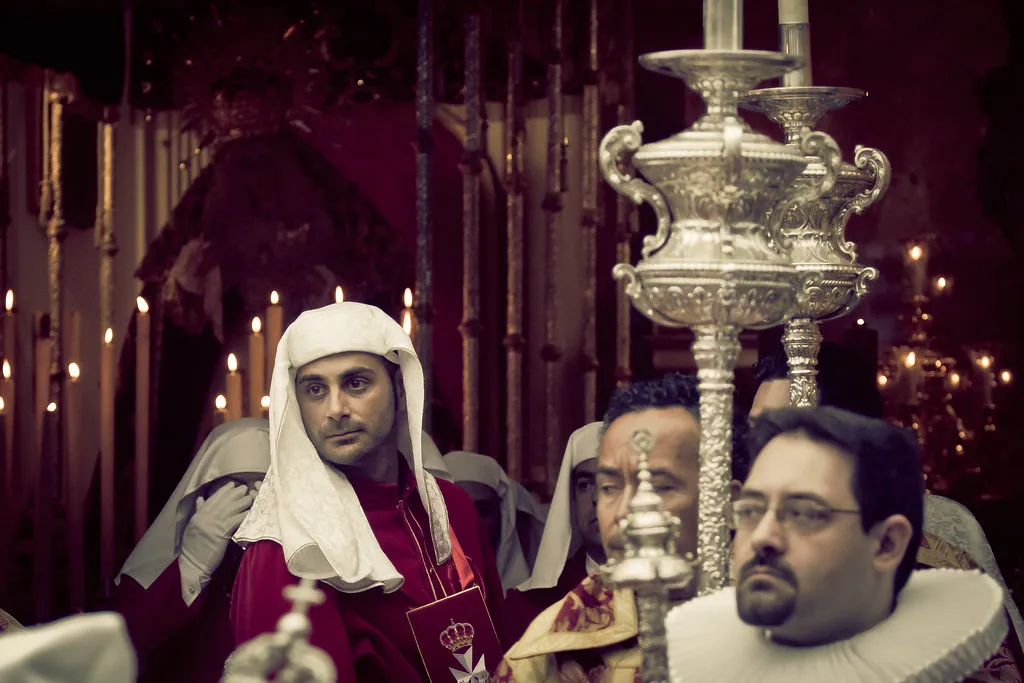 Nazarenos and tronos procession during Semana Santa Málaga
